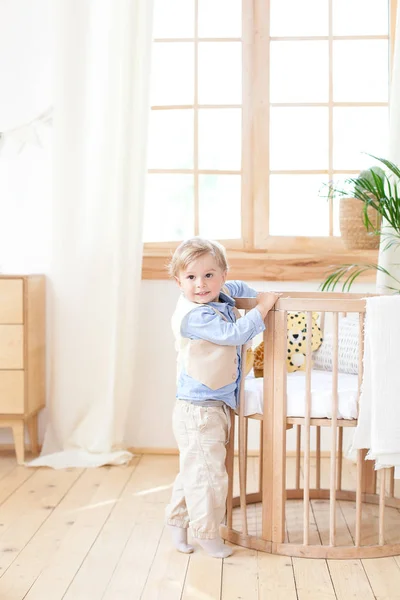 Little Boy Stands Alone Cot Nursery Lonely Baby Kindergarten Crib — 스톡 사진