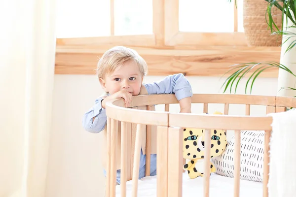 Little Boy Stands Alone Cot Nursery Lonely Baby Kindergarten Crib — 스톡 사진