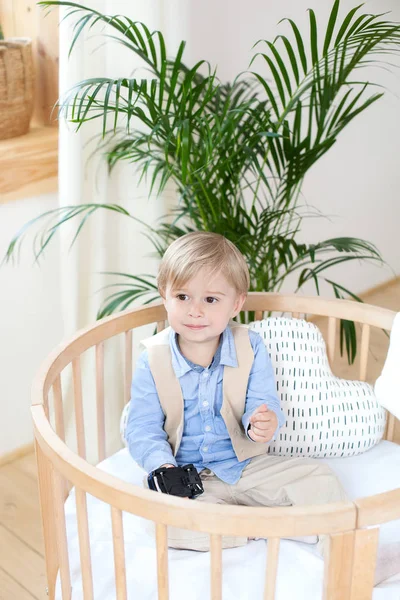 Little Boy Portrait Happy Boy Playing Baby Cot Boy Sits Stock Image