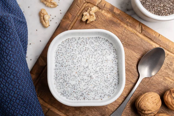 Chia seeds with milk. Chia pudding on table. Super food — Stock Photo, Image