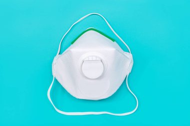 Safety mask FFP2 isolated on green background