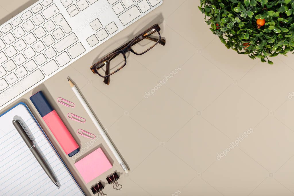 Top View of Workspace with some office supplies. Flat lay office desk. Copy space