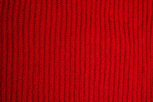 Wzór kolorowych swetrów na drutach z bliska. Ręcznie robiony produkt z wełny merino. Wzory robótek ręcznych. — Zdjęcie stockowe