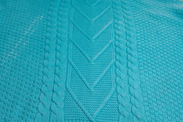 Wzór kolorowych swetrów na drutach z bliska. Ręcznie robiony produkt z wełny merino. Wzory robótek ręcznych. — Zdjęcie stockowe