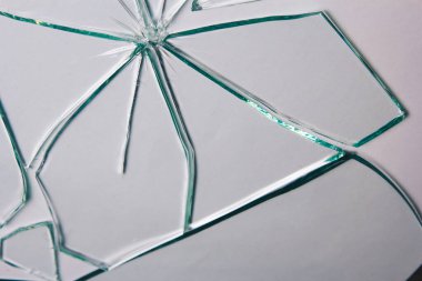 Broken glass pile pieces of texture and background isolated on white, cracked window effect. Emergency condition. clipart