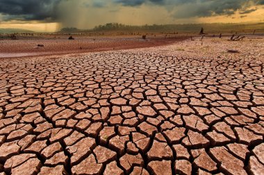 thunder storm sky Rain clouds Cracked dry land without wate clipart