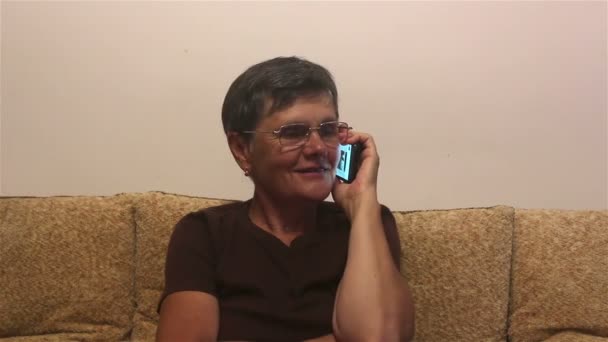 Attractive Adult Woman Makes Phone Call Her Smartphone Sitting Sofa — Stock Video