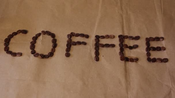 Inscription Coffee Laid Out Kraft Paper Which Coffee Beans Fall — Stock Video