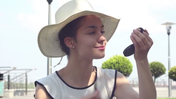 Beautiful Young Girl White Hat Paints Her Lips Red Lipstick — Stock Video