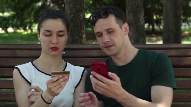 Young Couple Love Enter Credit Card Details Smartphone Pay Purchases — Stock Video