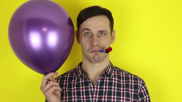 Portrait Young Guy Sad Face Who Holds Purple Balloon His — Stock Video