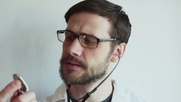 Young Beautiful Doctor Checks Serviceability Stethoscope While Preparing Examination Patients — Stock Video