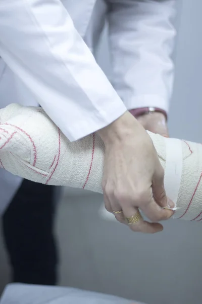 Doctor patient plaster cast