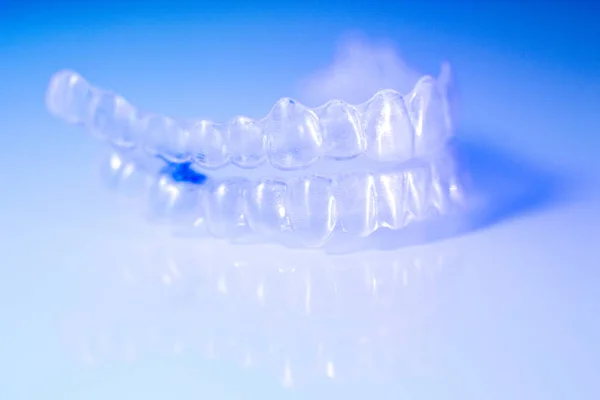 Invisible orthodontic aligners brackets — Stock Photo, Image