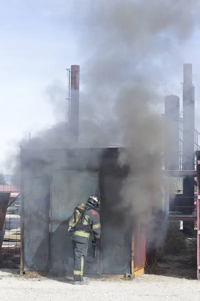 Fireman fire training station drill