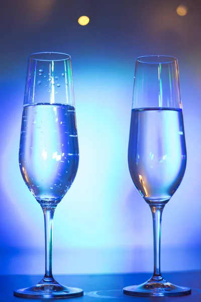 Bicchiere di champagne in discoteca party bar — Foto Stock