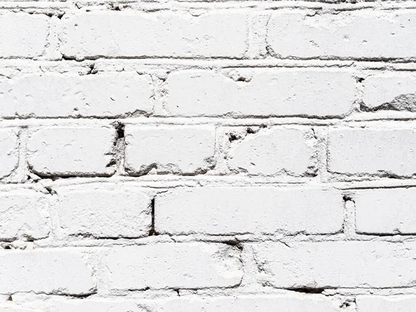 construction background - outdoor wall of house from white painted bricks