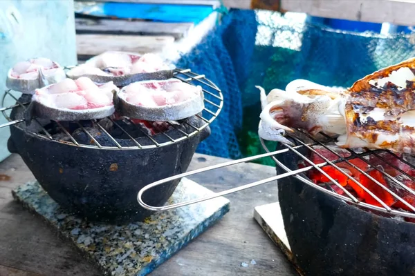 Grilled cuttlefish fish steaks on fire. — Stock Photo, Image
