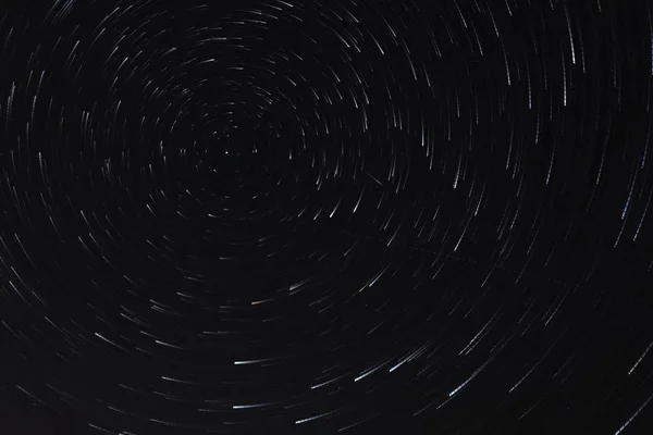 Long exposure starry sky, twisted tracks of stars. — Stock Photo, Image