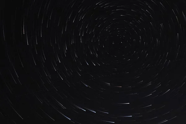 Long exposure starry sky, twisted tracks of stars. — Stock Photo, Image