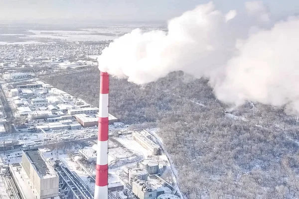 Smoking chimney of a thermal power plant on the background of wi — Stock Photo, Image