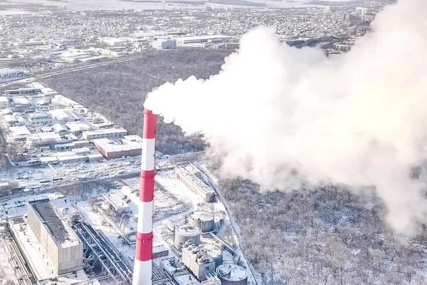 Smoking chimney of a thermal power plant on the background of wi — Stock Photo, Image