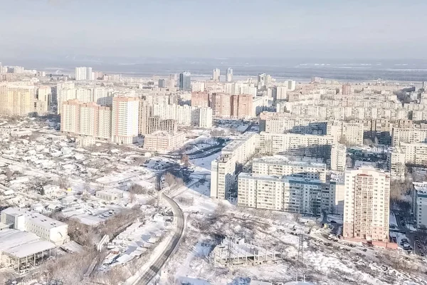 Winter city, high-rise residential development, frost in city.