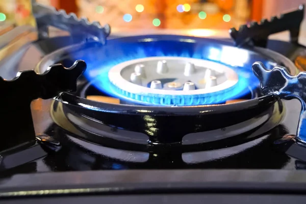 Burning gas stove. Blue flame of gas burner. — Stock Photo, Image