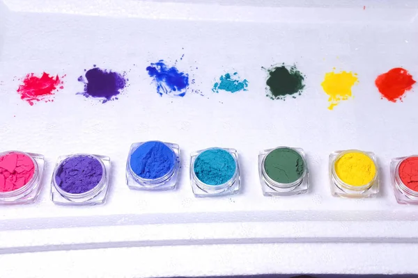 Multicolored powder paints. Paints in the form