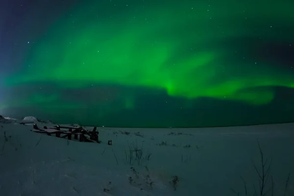 Aurora borealis in night northern sky. Ionization of air particl — 스톡 사진