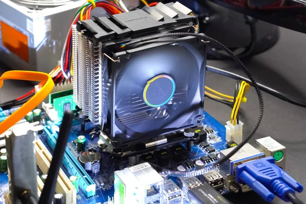 CPU cooling system. Cooler with radiator on the motherboard.