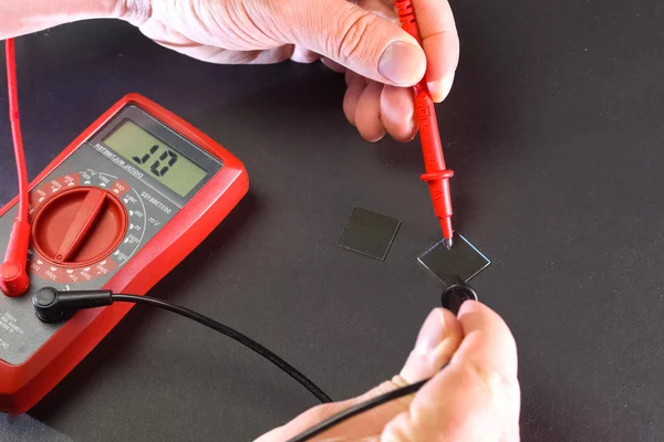 Measurement of product electrical parameters using multimeter.