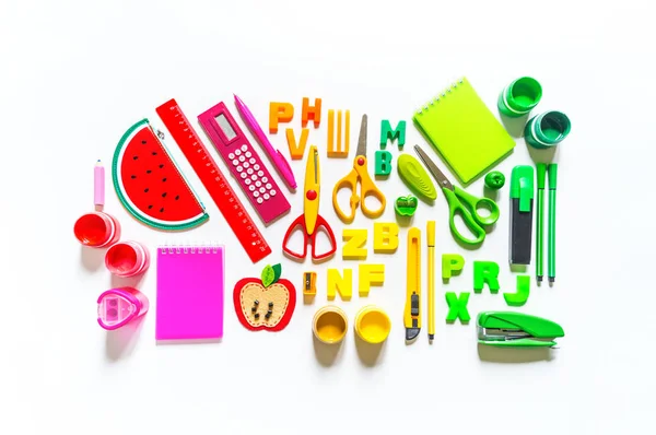 Stationery flat lay. Back to school. Office of the bright colors of the rainbow