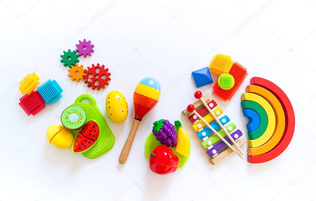 Toys for games with children. Horizontal Bright rainbow. Montessori