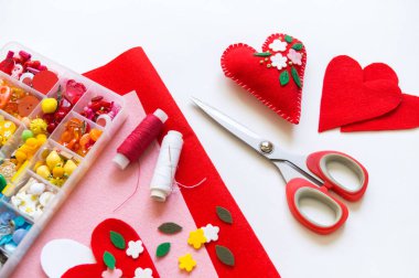 Valentine's day heart made of felt diy. Material for creativity.