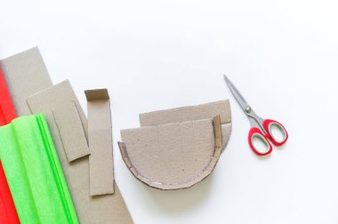 Craft diy pinata from paper and cardboard watermelon.