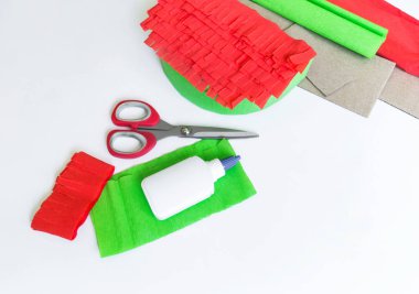 Craft diy pinata from paper and cardboard watermelon.