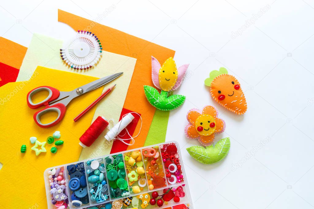 Carrot and flower made of felt.