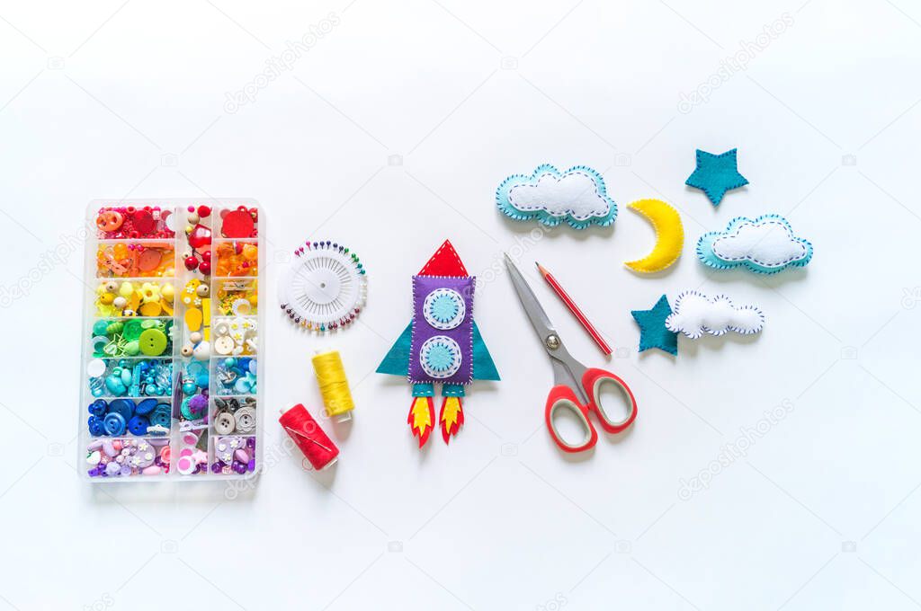 Rocket craft space toy. Made from felt. Material for children's creativity.