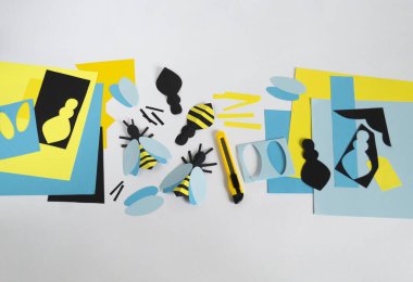 Kağıttan yapılmış arı. Yaratıcılık için malzeme ve araç. Hobi bebek beyaz geçmişi