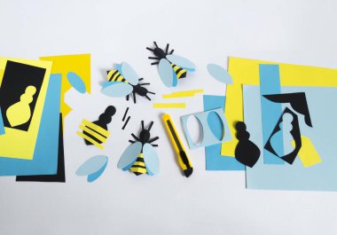 Kağıttan yapılmış arı. Yaratıcılık için malzeme ve araç. Hobi bebek beyaz geçmişi