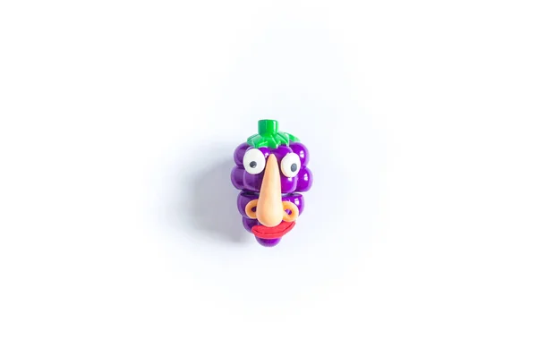 Toy Grapes Eyes Mouth Plasticine Conceptual Photo White Background — Stock Photo, Image