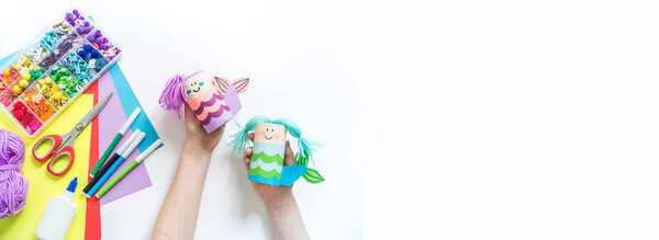 Mermaid crafts made of cardboard and paper. Children's creativity. Kindergarten training and school.