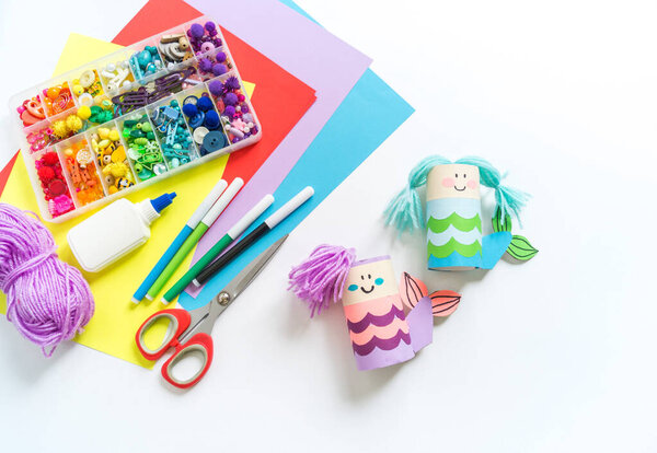 Mermaid crafts made of cardboard and paper. Children's creativity. Kindergarten training and school.