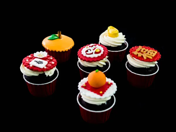 Cupcake in chinese theme, black background — Stock Photo, Image