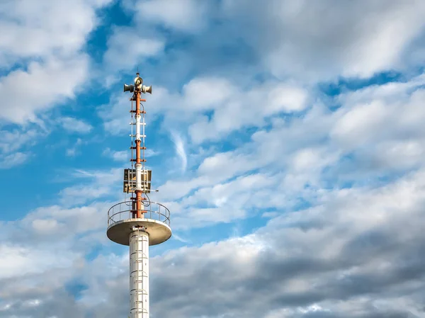 Tsunami siren warning loudspeakers are installed on the beach in