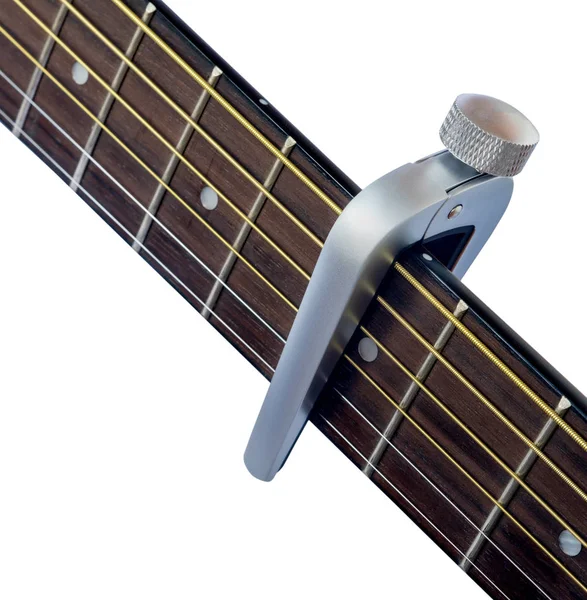 Capo Guitar Fingerboard White Background Close — стоковое фото