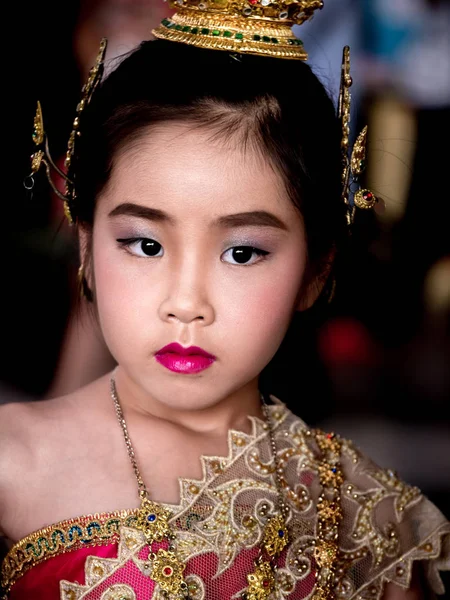 Asian little kid girl dress the Thai traditional dress , National Costumes, close up shot