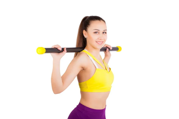 Sport girl gazdaság egy bodybar. elszigetelt fehér background — Stock Fotó