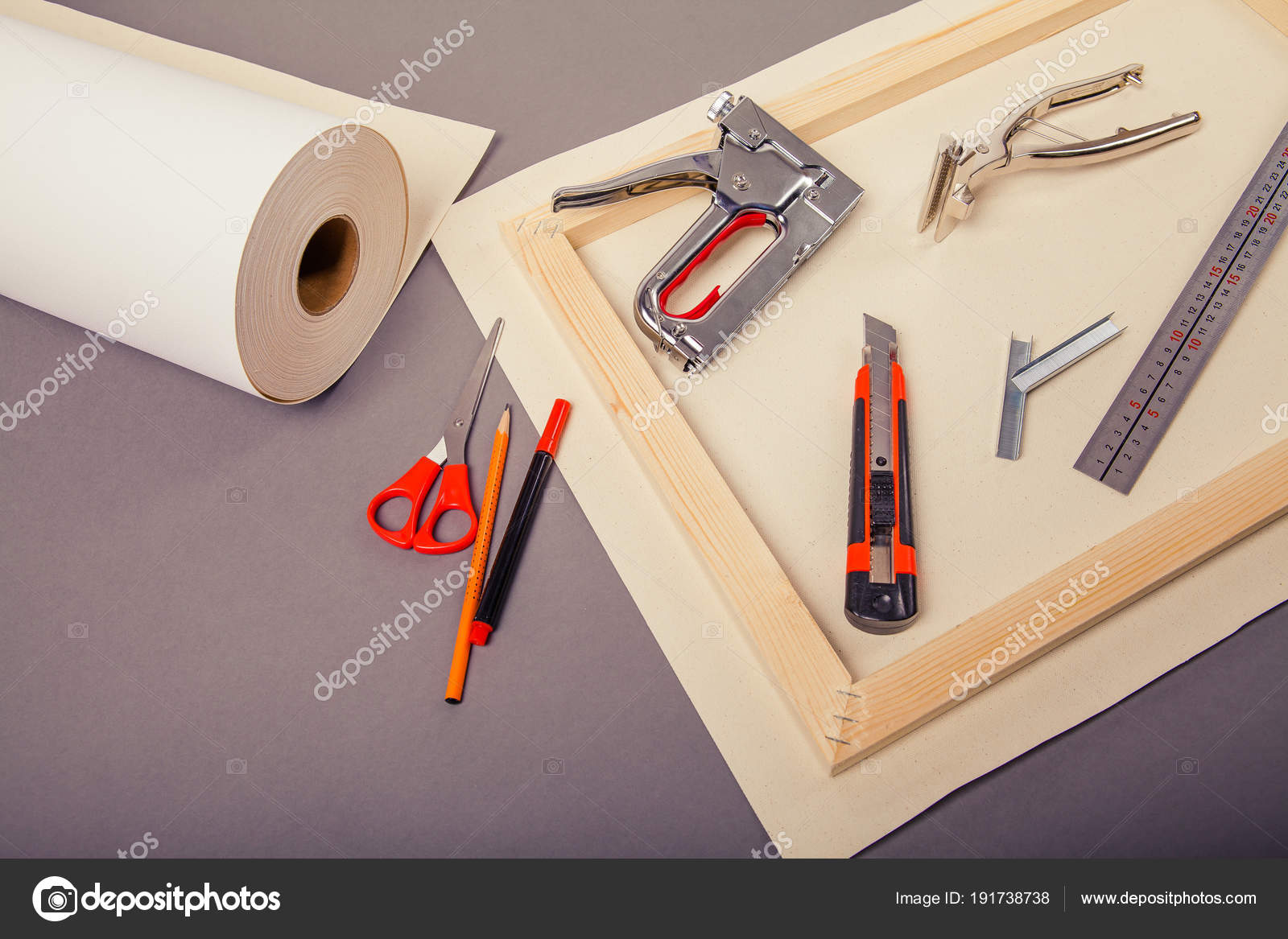 Canvas artist on roll, stretcher for canvas, staple gun and other tools